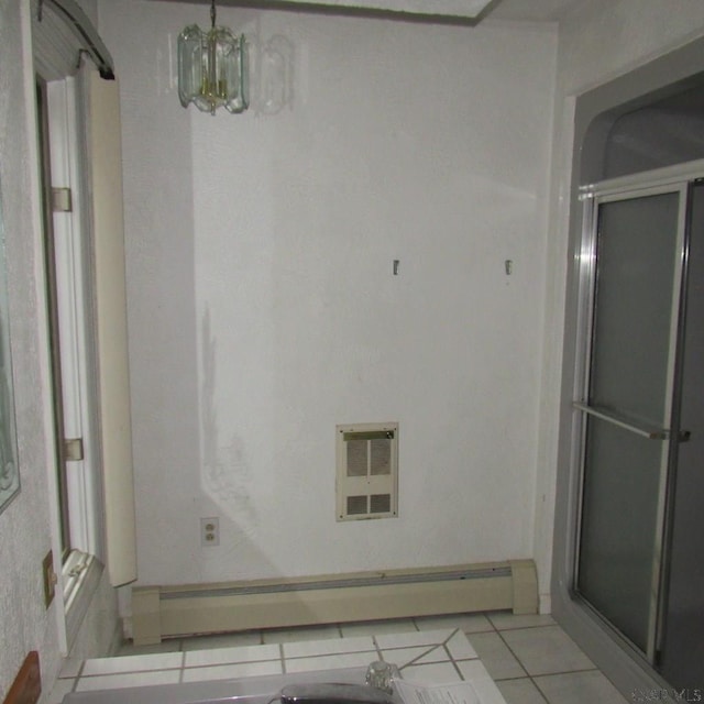 313 Dalton Run Rd, Johnstown, PA 15905 - bathroom featuring tile patterned floors, a baseboard heating unit, a chandelier, and a shower stall