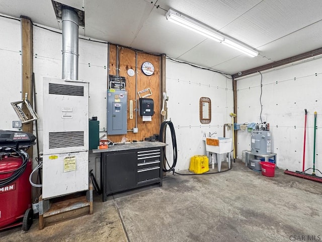 garage with sink and electric panel