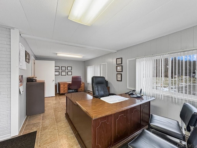 home office featuring light tile patterned flooring