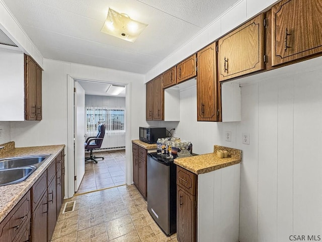 kitchen with range and sink