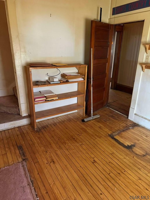 interior space with hardwood / wood-style flooring