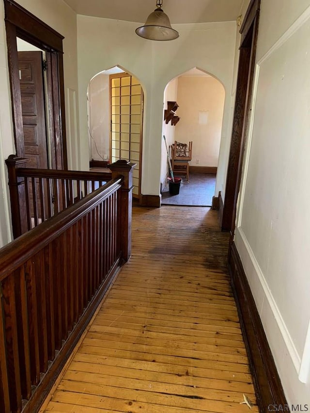 hallway featuring hardwood / wood-style floors