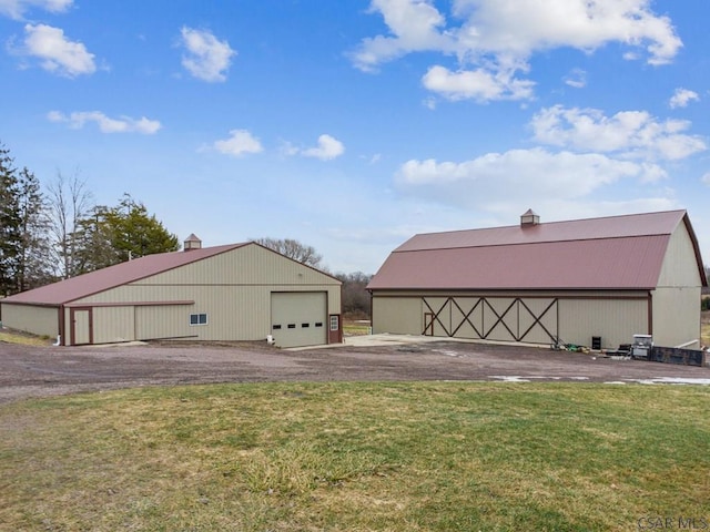 garage with a lawn