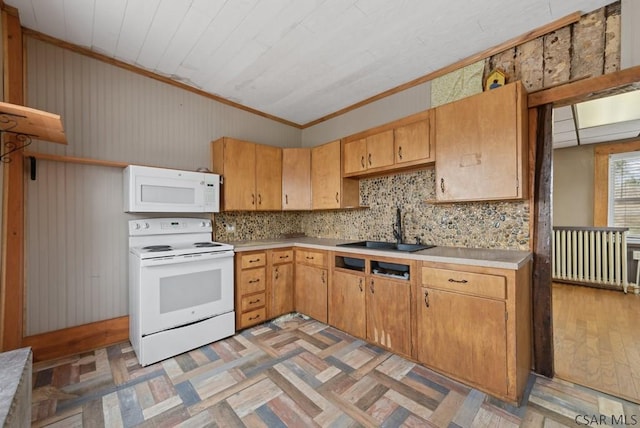 kitchen with sink, crown molding, light wood-type flooring, white appliances, and backsplash