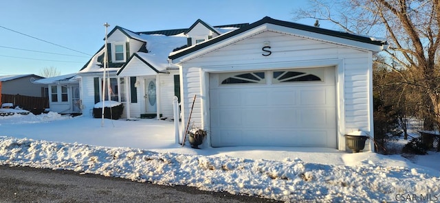 view of front of property featuring a garage