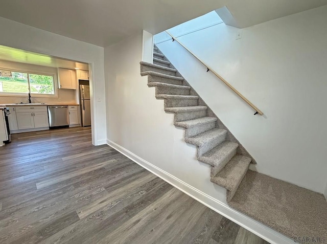 247 Jefferson Ave, Windber, PA 15963 - staircase with wood finished floors