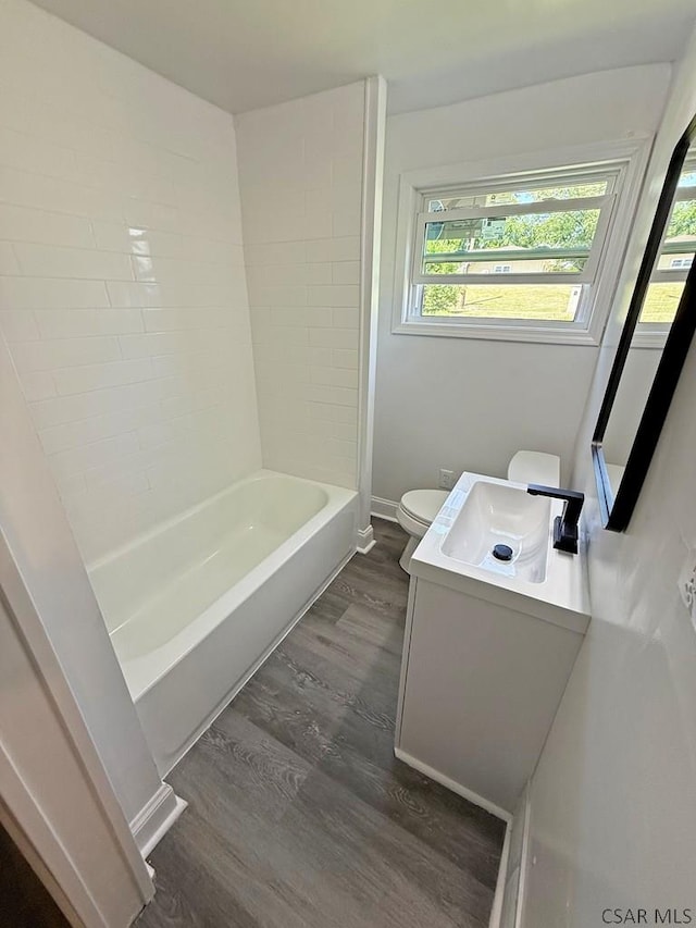 247 Jefferson Ave, Windber, PA 15963 - full bath with vanity, wood finished floors, and bathing tub / shower combination