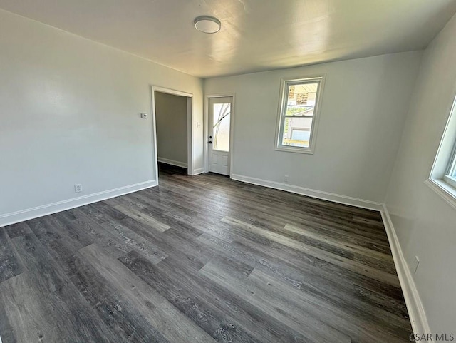 247 Jefferson Ave, Windber, PA 15963 - empty room with dark wood-style flooring and baseboards