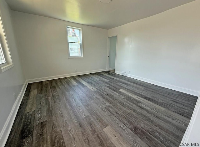 247 Jefferson Ave, Windber, PA 15963 - unfurnished room with dark wood-type flooring and baseboards