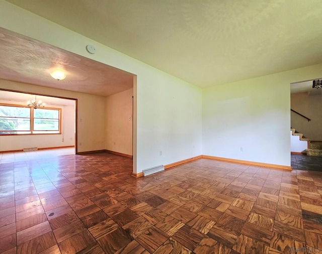2139 Woodcrest Dr, Johnstown, PA 15905 - unfurnished room featuring a chandelier, baseboards, stairway, and a smoke detector