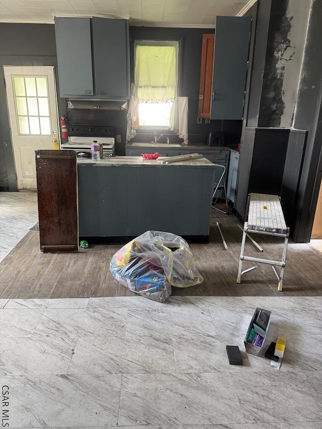 kitchen featuring gray cabinetry and white electric stove