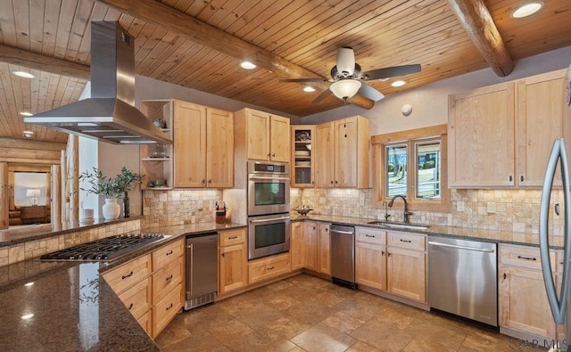 kitchen with beam ceiling, light brown cabinets, island exhaust hood, a sink, and stainless steel appliances