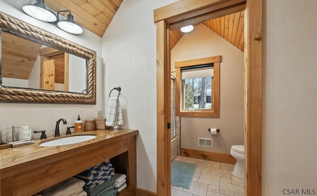 full bathroom with visible vents, baseboards, vaulted ceiling, stone tile floors, and wooden ceiling