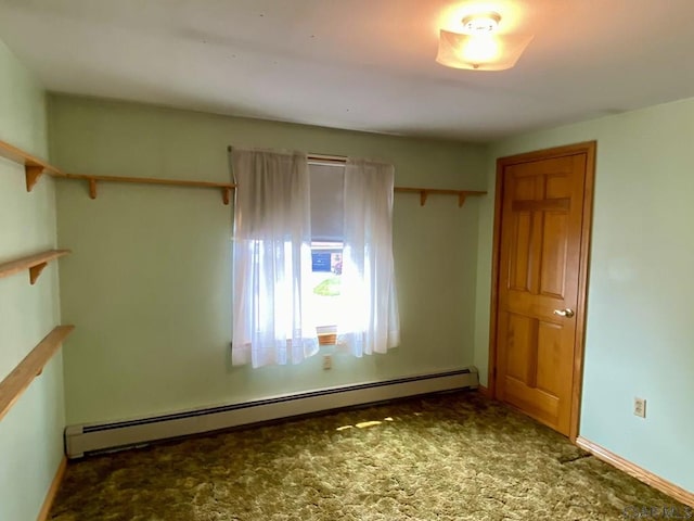 104 Erin Rd, Johnstown, PA 15905 - unfurnished bedroom featuring a baseboard heating unit, carpet, and baseboards