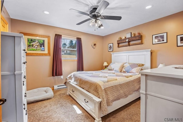 bedroom with a baseboard heating unit, recessed lighting, light carpet, and ceiling fan