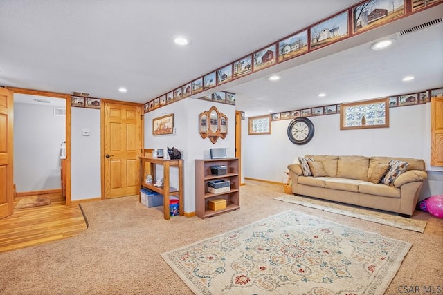 living area with carpet floors, baseboards, and recessed lighting