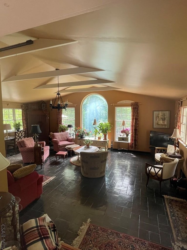 230 Trading Post Rd, Stoystown, PA 15563 - living area with plenty of natural light, a chandelier, and dark stone finish flooring