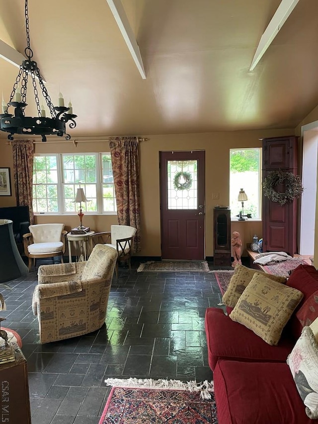 230 Trading Post Rd, Stoystown, PA 15563 - entryway with plenty of natural light, a chandelier, stone tile floors, and lofted ceiling