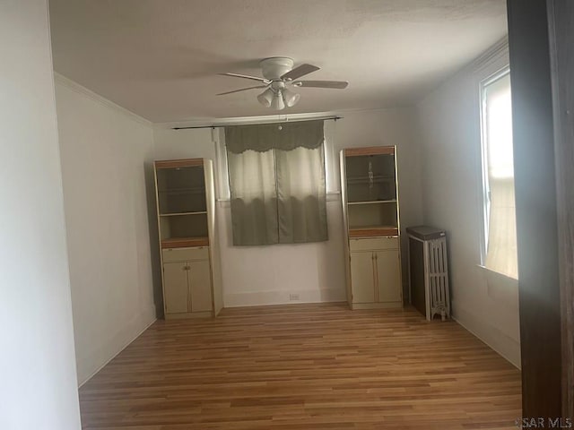 209 Dupont St, Johnstown, PA 15902 - unfurnished room featuring wood finished floors, ceiling fan, healthy amount of natural light, and ornamental molding