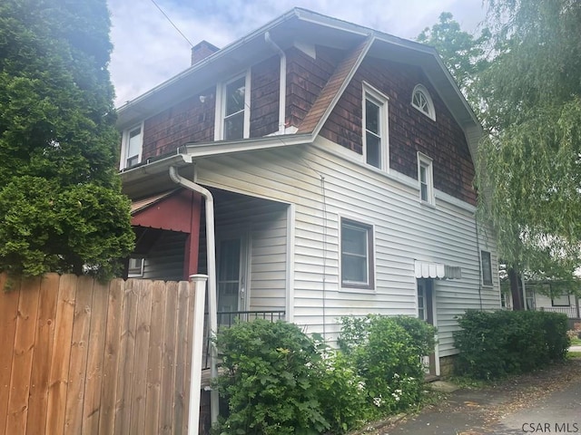 209 Dupont St, Johnstown, PA 15902 - view of home's exterior with a chimney