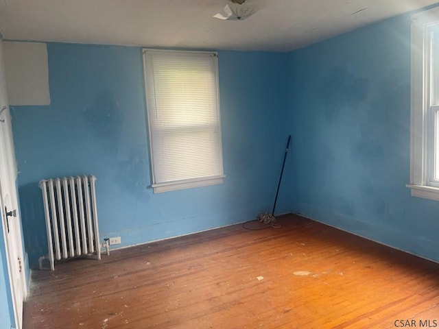 209 Dupont St, Johnstown, PA 15902 - spare room featuring radiator and wood-type flooring
