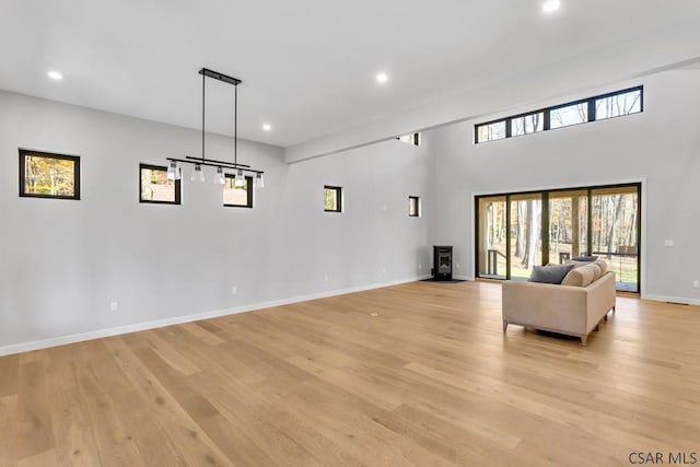 unfurnished living room with light wood-type flooring