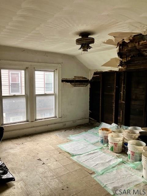 interior space featuring vaulted ceiling