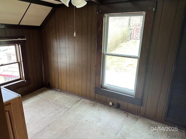 298 Lunen St, Johnstown, PA 15902 - interior space featuring wooden walls, a ceiling fan, and light carpet