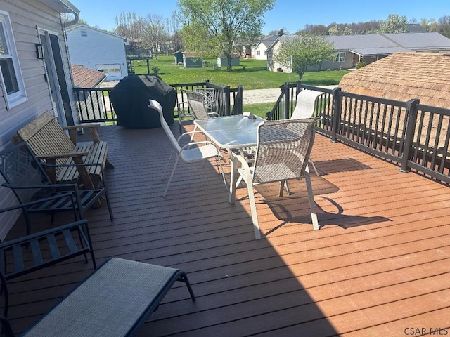 1501 Maplehurst Dr, Somerset, PA 15501 - deck featuring outdoor dining space, a residential view, and a lawn