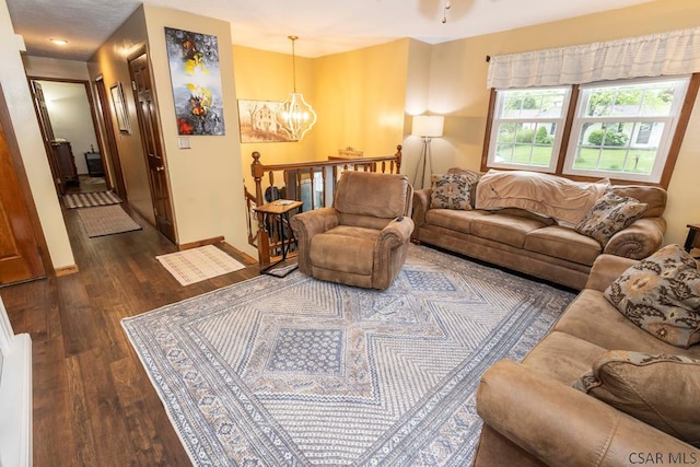 1501 Maplehurst Dr, Somerset, PA 15501 - living room with a chandelier, dark wood finished floors, and baseboards