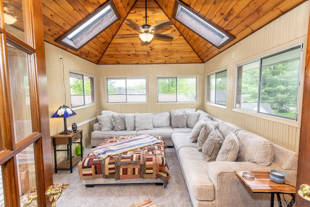 1501 Maplehurst Dr, Somerset, PA 15501 - carpeted living area with a skylight, vaulted ceiling, and ceiling fan