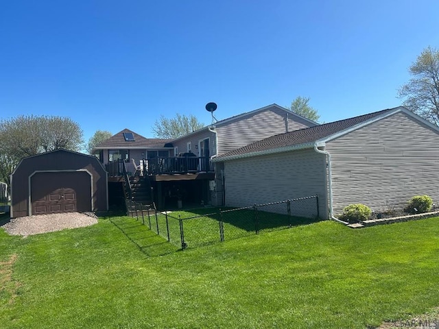 1501 Maplehurst Dr, Somerset, PA 15501 - rear view of house featuring an outdoor structure, a wooden deck, and a garage