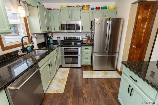 1501 Maplehurst Dr, Somerset, PA 15501 - kitchen featuring appliances with stainless steel finishes, green cabinetry, a sink, and dark wood-style flooring