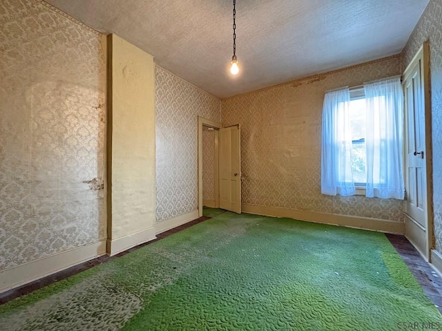 603 Woodvale Ave, Johnstown, PA 15901 - carpeted empty room featuring a textured ceiling and wallpapered walls