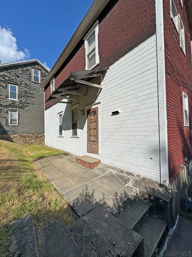 603 Woodvale Ave, Johnstown, PA 15901 - rear view of house featuring a patio area and a yard