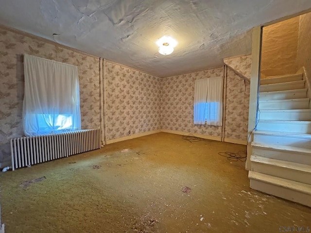 603 Woodvale Ave, Johnstown, PA 15901 - unfurnished room featuring radiator heating unit and wallpapered walls