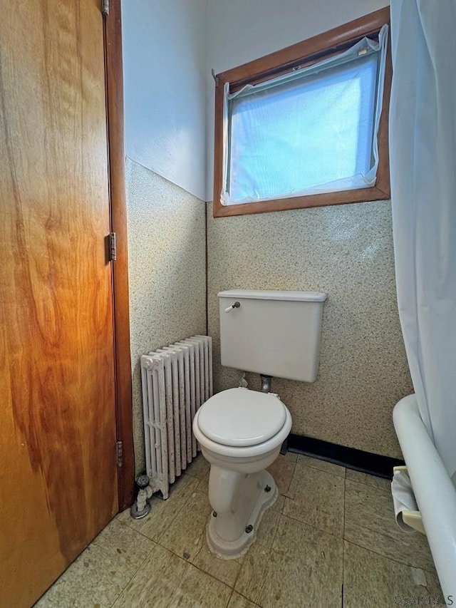 603 Woodvale Ave, Johnstown, PA 15901 - bathroom featuring radiator heating unit and toilet