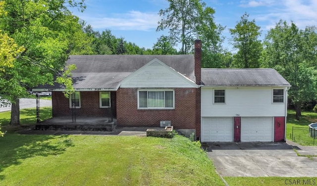 751 Pike Rd, Johnstown, PA 15909 - back of house with driveway, a garage, a chimney, a porch, and brick siding