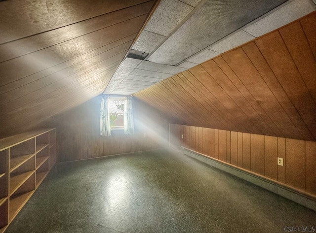 751 Pike Rd, Johnstown, PA 15909 - additional living space with wood walls, a baseboard heating unit, tile patterned floors, and lofted ceiling