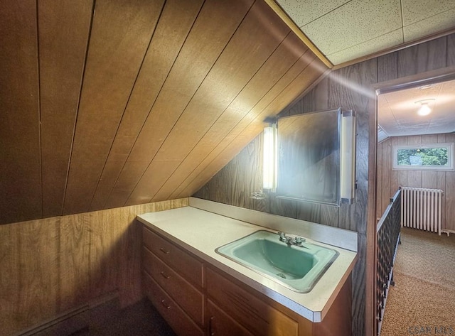 751 Pike Rd, Johnstown, PA 15909 - bathroom featuring wooden walls, lofted ceiling, vanity, radiator heating unit, and wood ceiling