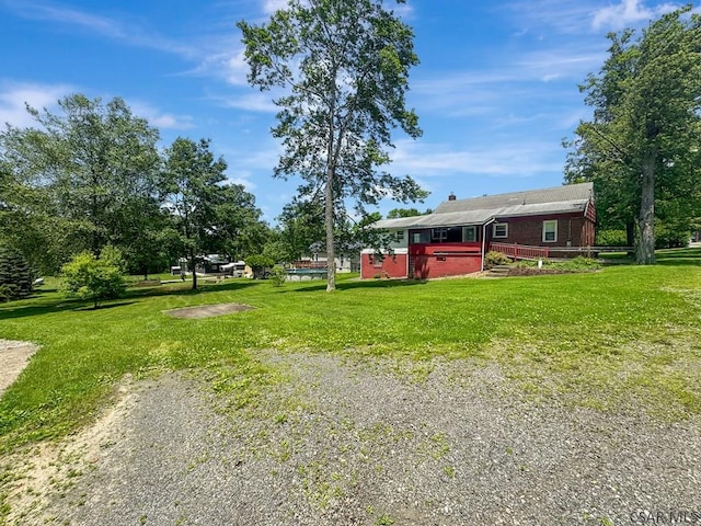 751 Pike Rd, Johnstown, PA 15909 - view of grassy yard featuring a deck