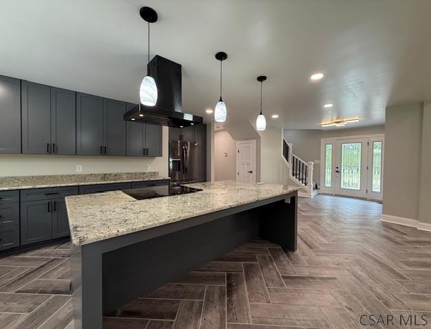 2200 Dundee Ln, Johnstown, PA 15905 - kitchen with island range hood, light stone countertops, recessed lighting, gray cabinets, and baseboards
