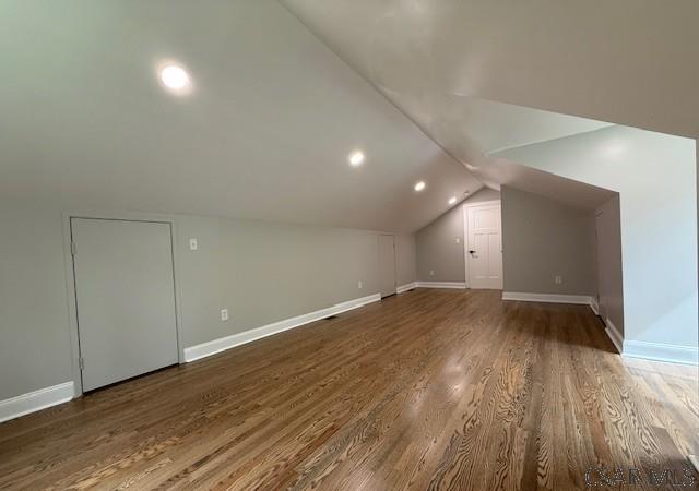 2200 Dundee Ln, Johnstown, PA 15905 - additional living space with wood finished floors, baseboards, lofted ceiling, and recessed lighting