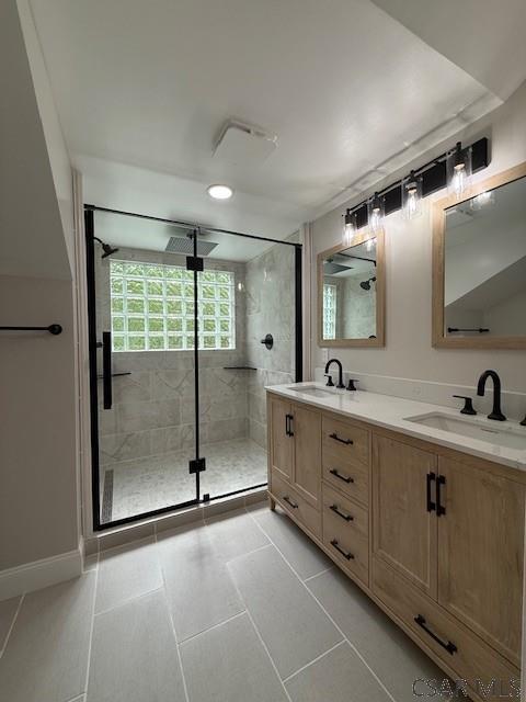 2200 Dundee Ln, Johnstown, PA 15905 - full bathroom featuring a shower stall, double vanity, and tile patterned floors