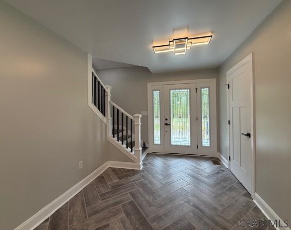 2200 Dundee Ln, Johnstown, PA 15905 - foyer entrance featuring baseboards and stairway