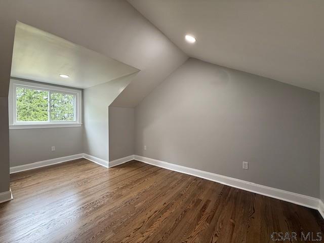 2200 Dundee Ln, Johnstown, PA 15905 - bonus room with vaulted ceiling, dark wood finished floors, baseboards, and recessed lighting