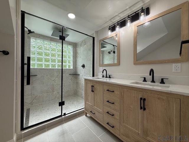 2200 Dundee Ln, Johnstown, PA 15905 - bathroom featuring a shower stall, double vanity, and tile patterned floors