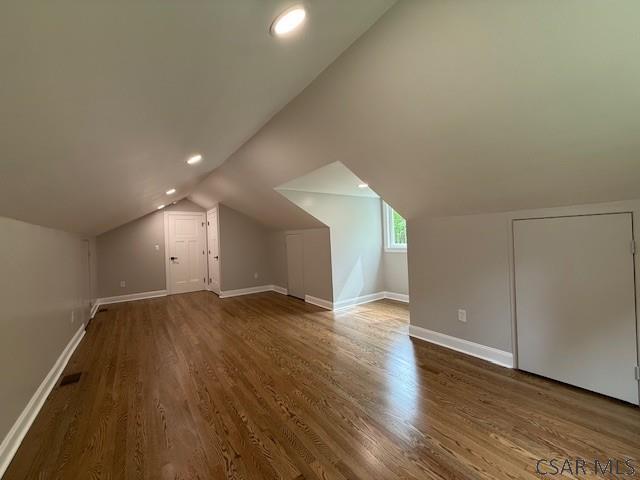 2200 Dundee Ln, Johnstown, PA 15905 - bonus room with wood finished floors, baseboards, vaulted ceiling, and recessed lighting