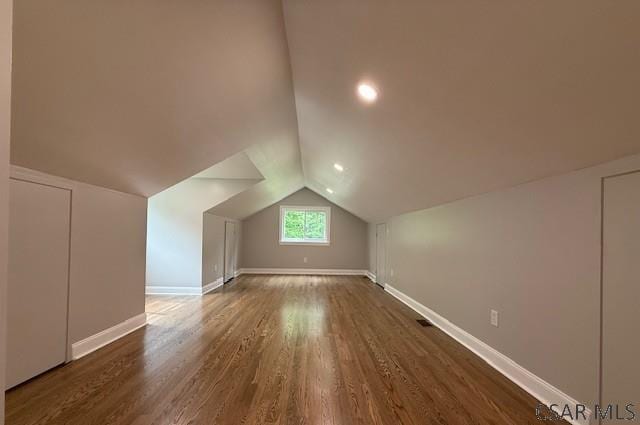 2200 Dundee Ln, Johnstown, PA 15905 - additional living space featuring wood finished floors, baseboards, and lofted ceiling