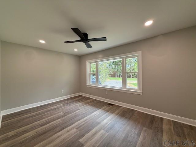 2200 Dundee Ln, Johnstown, PA 15905 - empty room with baseboards, dark wood finished floors, recessed lighting, and a ceiling fan